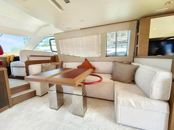  Yacht Photos Pics Luxurious interior of 2021 Monte Carlo MC6 yacht with modern seating and elegant decor.