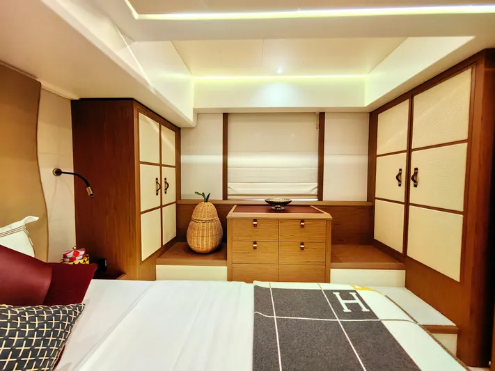  Yacht Photos Pics Luxurious Monte Carlo MC6 2021 yacht interior with elegant wood cabinetry and modern decor.