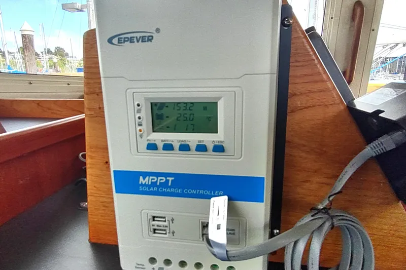 Bernardi Yacht Photos Pics MPPT solar charge controller on 2004 Nordic Tug 32 boat, displaying power metrics.