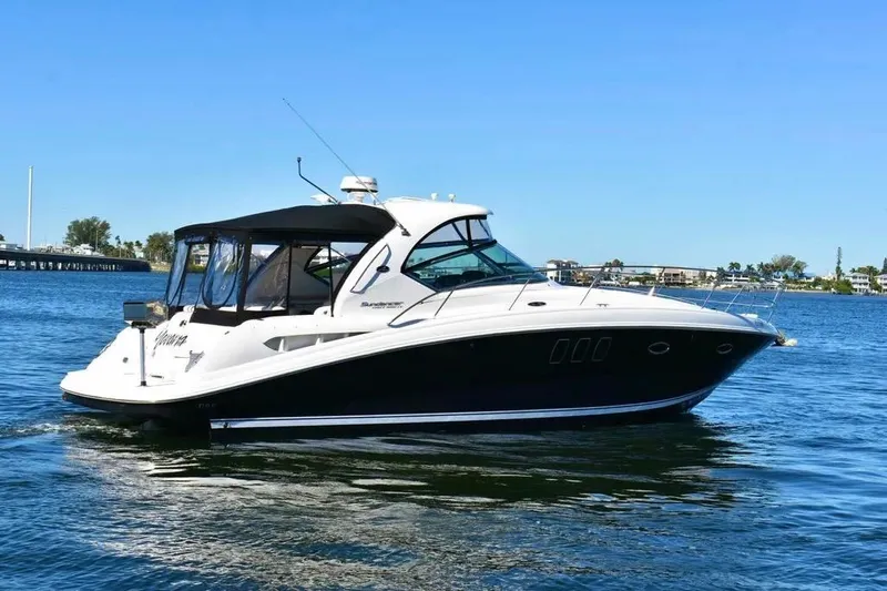  Yacht Photos Pics 2010 Sea Ray 390 Sundancer yacht cruising on a sunny day.