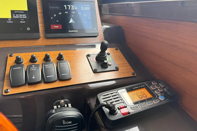  Yacht Photos Pics Control panel of 2025 Ranger Tugs R-27 with navigation and communication equipment.