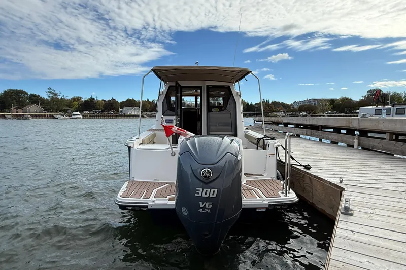  Yacht Photos Pics 2025 Ranger Tugs R-27 boat docked, featuring a powerful 300 V6 engine.