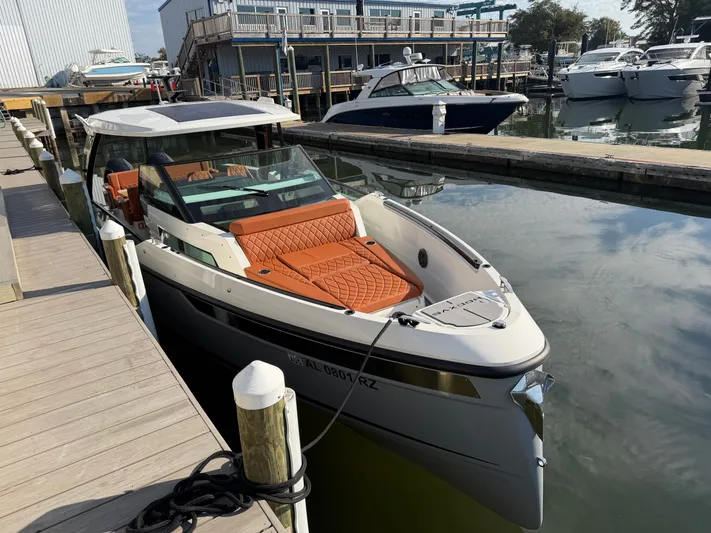  Yacht Photos Pics Saxdor 320 GTO 2025, modern motorboat docked at marina.