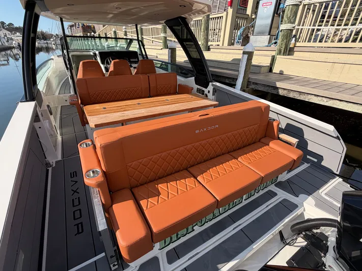  Yacht Photos Pics Luxurious interior of 2025 Saxdor 320 GTO with orange seating.