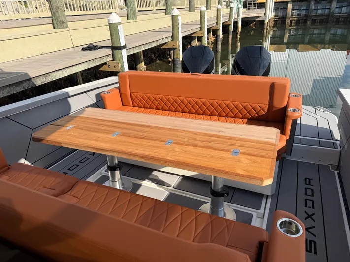  Yacht Photos Pics Luxurious interior of Saxdor 320 GTO 2025 with wooden table.
