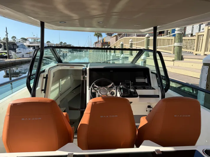  Yacht Photos Pics Interior view of 2025 Saxdor 320 GTO with orange seats.