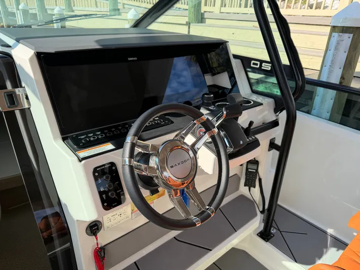  Yacht Photos Pics 2025 Saxdor 320 GTO helm with modern electronics.