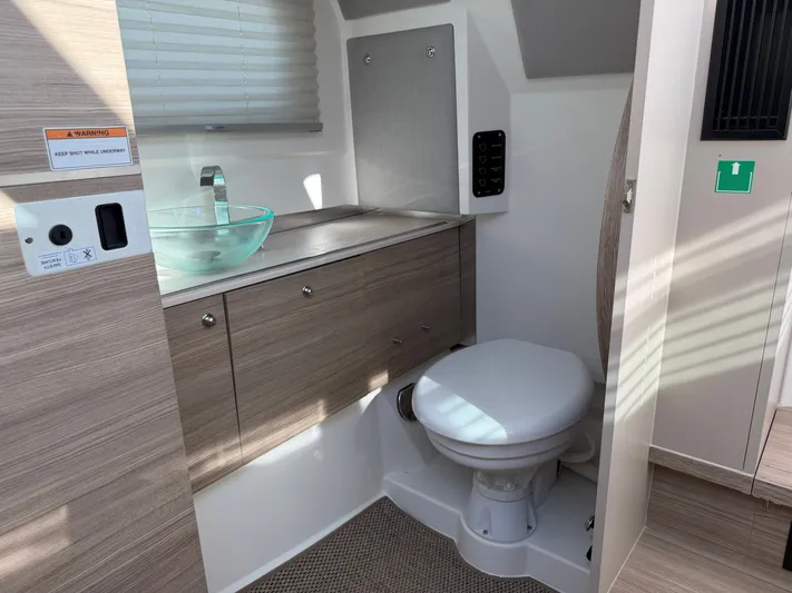  Yacht Photos Pics Interior of Saxdor 320 GTO 2025 featuring toilet and sink.