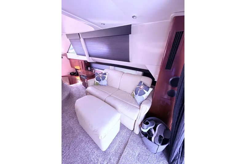 Elevate Yacht Photos Pics Luxurious interior of 2003 Carver 360 Sport Sedan with plush seating and modern decor.