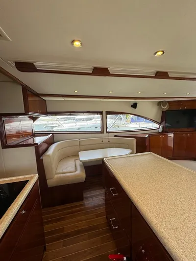 Spill Yacht Photos Pics Interior of a 2007 Bertram 510 Convertible yacht with modern furnishings.