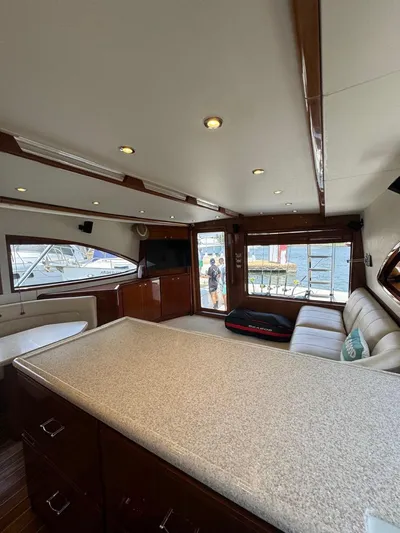 Spill Yacht Photos Pics Interior of a 2007 Bertram 510 Convertible yacht with modern furnishings.