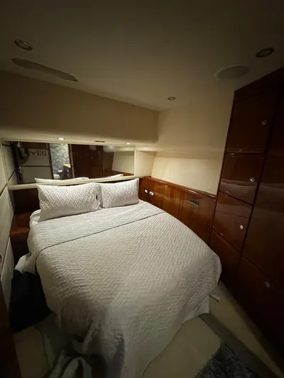 Spill Yacht Photos Pics Luxurious bedroom interior of 2007 Bertram 510 Convertible yacht with cozy bedding.