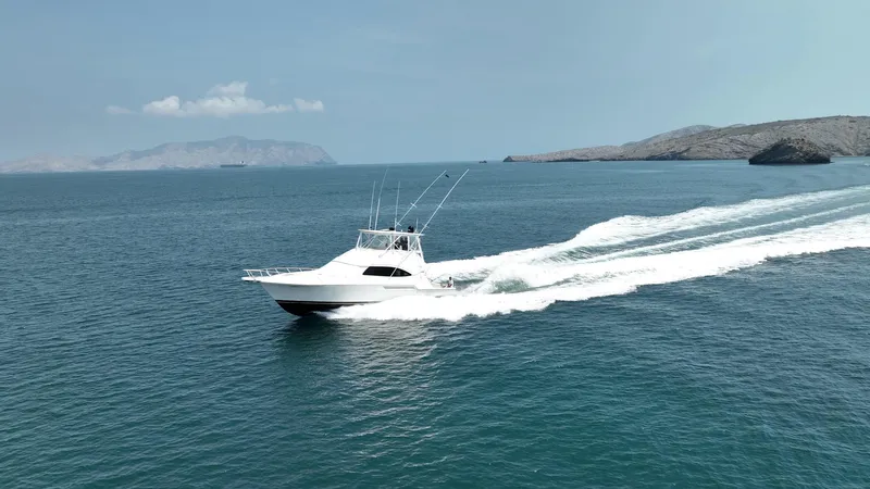 Spill Yacht Photos Pics 2007 Bertram 510 Convertible yacht cruising on open water.