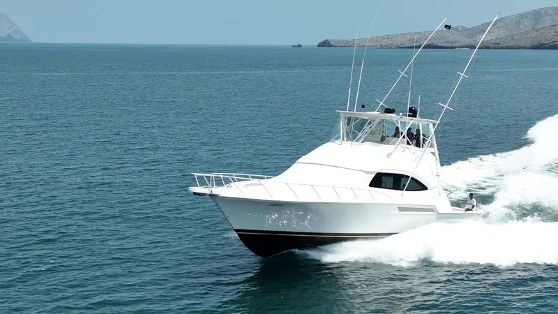 Spill Yacht Photos Pics 2007 Bertram 510 Convertible yacht cruising on open water.