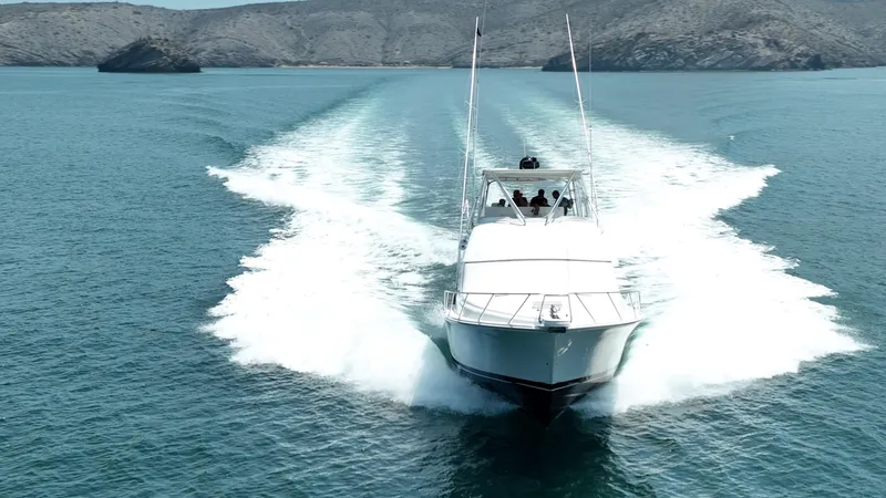 Spill Yacht Photos Pics 2007 Bertram 510 Convertible yacht cruising on open water.