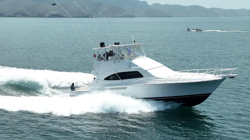 Spill Yacht Photos Pics 2007 Bertram 510 Convertible yacht cruising on open water.