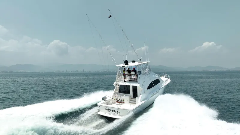 Spill Yacht Photos Pics 2007 Bertram 510 Convertible yacht cruising on open water.