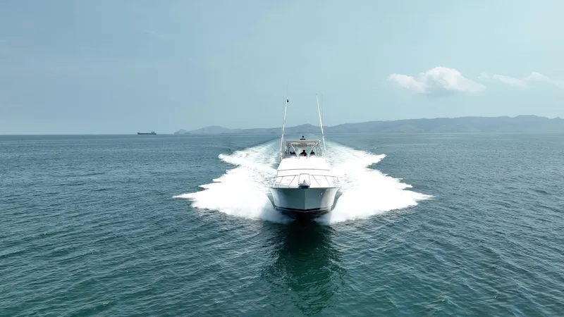 Spill Yacht Photos Pics 2007 Bertram 510 Convertible yacht cruising on open water.