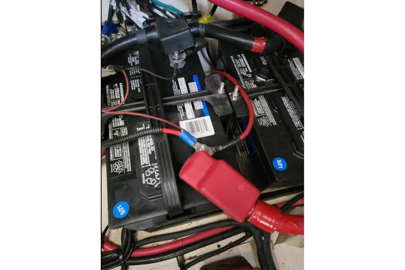  Yacht Photos Pics Battery setup in a 2011 Sea Ray 310 Sundancer boat engine compartment.