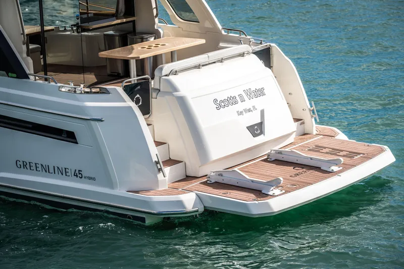 Scotts N Water Yacht Photos Pics 2024 Greenline 45 Coupe Hybrid yacht on water, rear view with open deck.