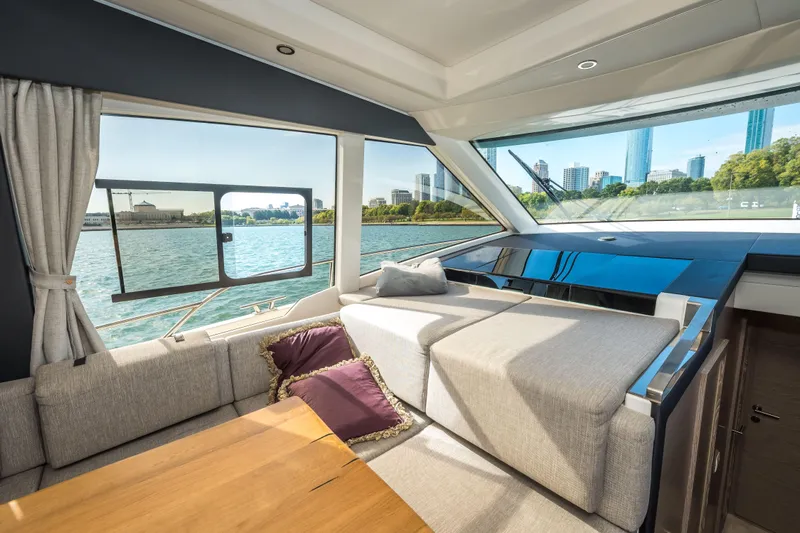 Scotts N Water Yacht Photos Pics Interior of 2024 Greenline 45 Coupe Hybrid yacht with waterfront city view.