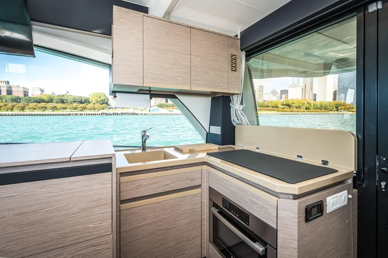 Scotts N Water Yacht Photos Pics Interior of 2024 Greenline 45 Coupe Hybrid yacht with modern kitchen design.