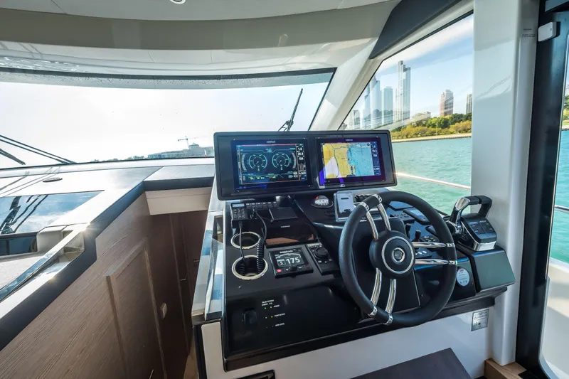 Scotts N Water Yacht Photos Pics 2024 Greenline 45 Coupe Hybrid yacht cockpit with advanced navigation displays.