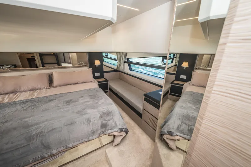 Scotts N Water Yacht Photos Pics Luxurious interior of 2024 Greenline 45 Coupe Hybrid yacht bedroom with elegant furnishings.