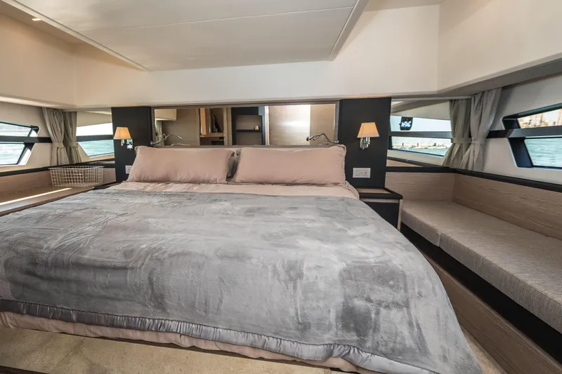 Scotts N Water Yacht Photos Pics Luxurious bedroom interior of 2024 Greenline 45 Coupe Hybrid yacht with ocean view.