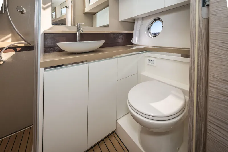 Scotts N Water Yacht Photos Pics 2024 Greenline 45 Coupe Hybrid yacht bathroom with modern fixtures and sleek design.