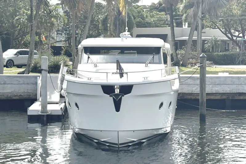 Scotts N Water Yacht Photos Pics 2024 Greenline 45 Coupe Hybrid yacht docked at a marina, front view.