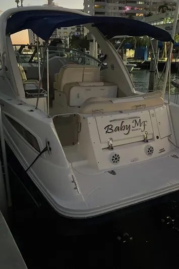  Yacht Photos Pics 2012 Sea Ray 350 Sundancer docked at marina during sunset.