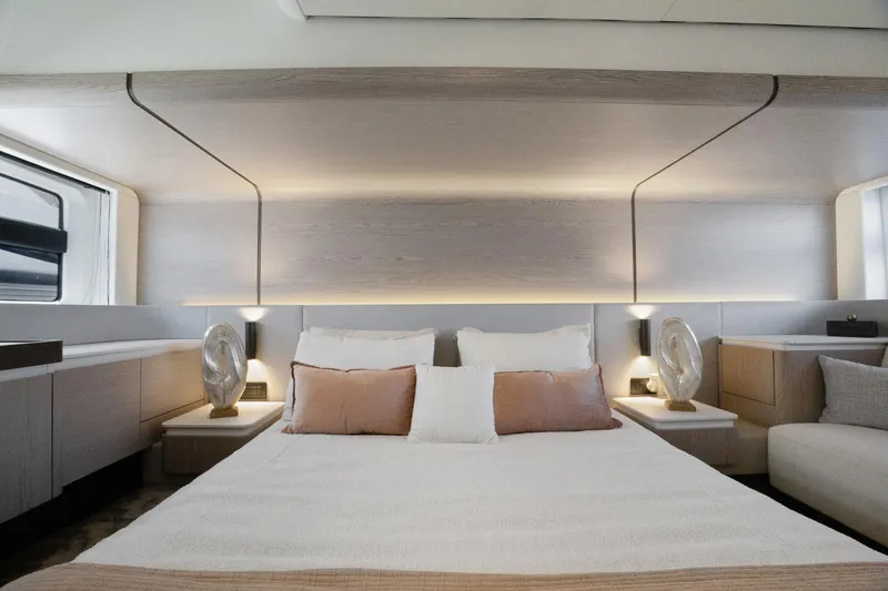 Guyal Yacht Photos Pics Luxurious bedroom interior of 2024 Azimut Fly 53 yacht with modern design elements.