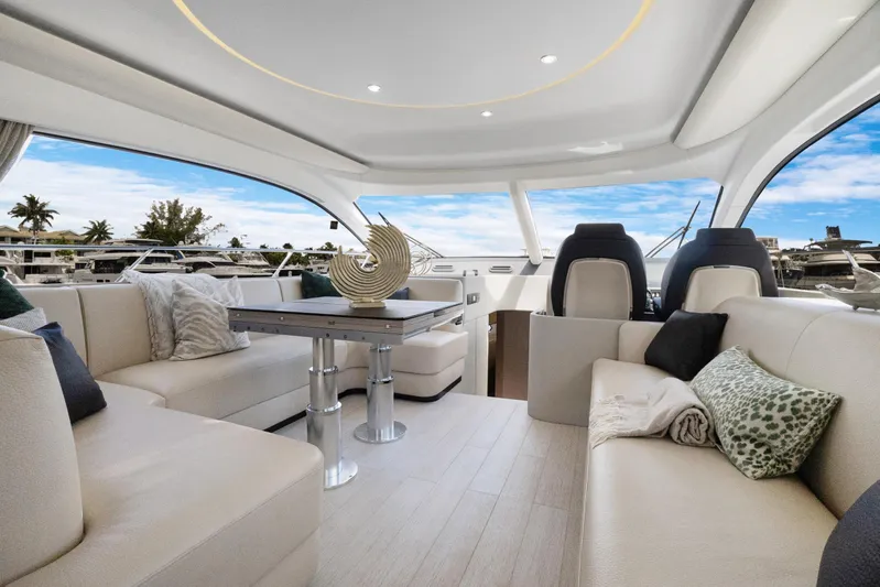 Guyal Yacht Photos Pics Luxurious interior of 2024 Azimut Fly 53 yacht with elegant seating and modern decor.