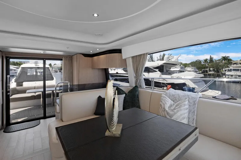 Guyal Yacht Photos Pics Luxurious interior of 2024 Azimut Fly 53 yacht with marina view.