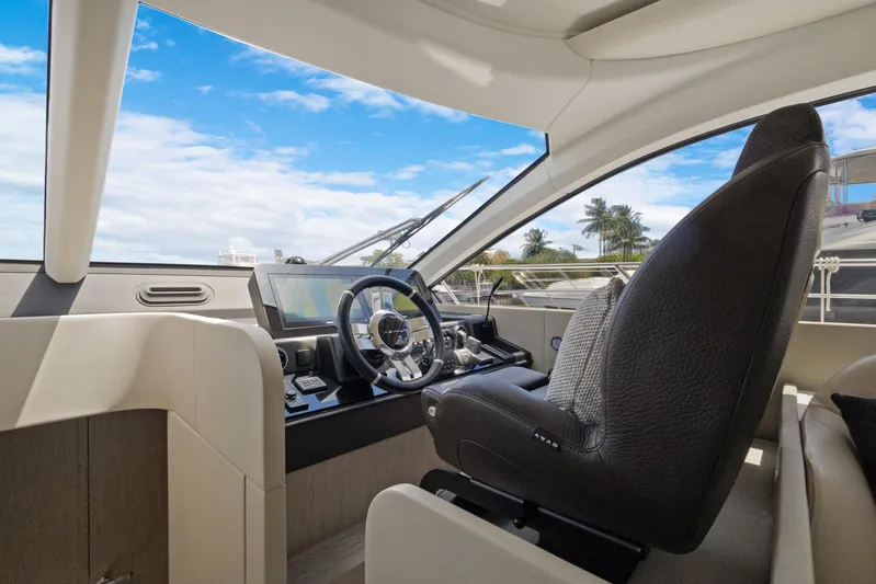 Guyal Yacht Photos Pics 2024 Azimut Fly 53 yacht cockpit with modern steering and navigation system.