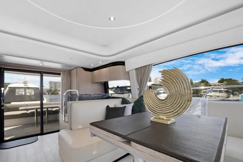 Guyal Yacht Photos Pics Luxurious interior of 2024 Azimut Fly 53 yacht with elegant decor and scenic views.