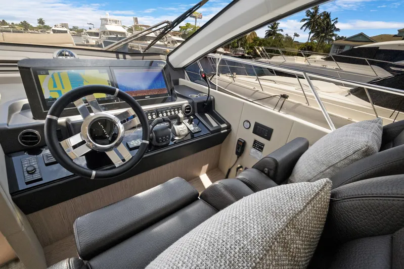 Guyal Yacht Photos Pics 2024 Azimut Fly 53 yacht cockpit with modern steering and navigation systems.