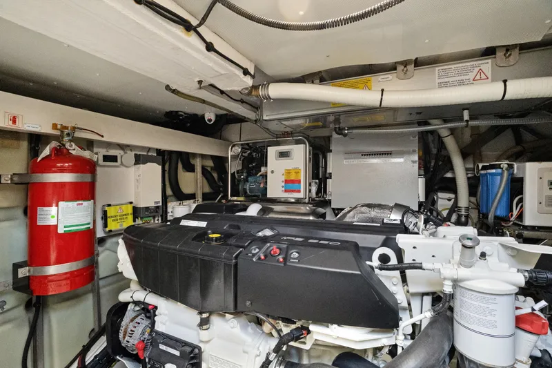 Guyal Yacht Photos Pics Engine room of 2024 Azimut Fly 53 yacht, featuring modern equipment and fire safety system.