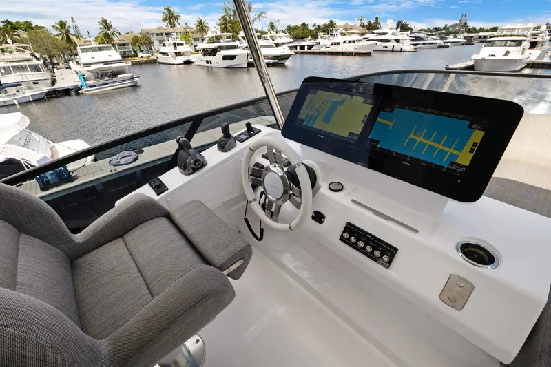 Guyal Yacht Photos Pics 2024 Azimut Fly 53 yacht helm with modern navigation displays and luxurious seating.