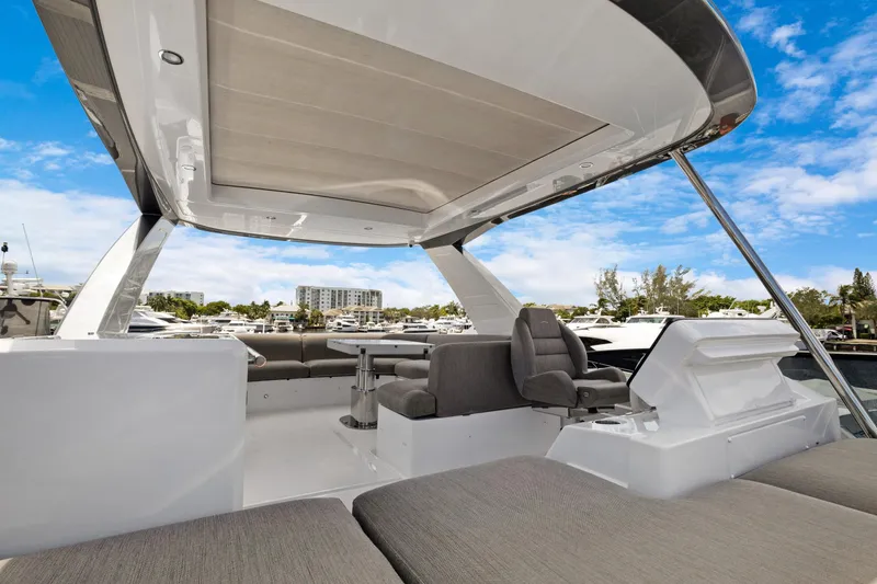 Guyal Yacht Photos Pics Luxurious 2024 Azimut Fly 53 yacht interior with modern seating and sleek design.