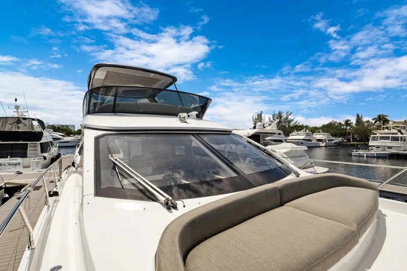 Guyal Yacht Photos Pics 2024 Azimut Fly 53 yacht docked under a clear blue sky.