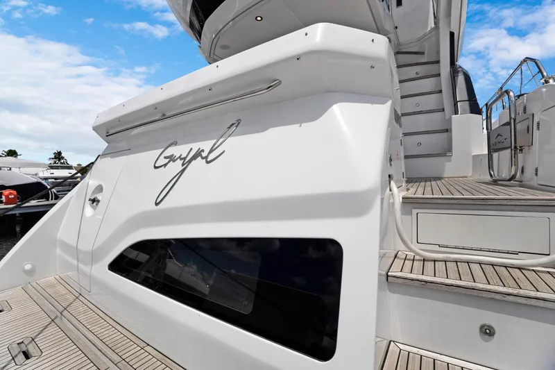 Guyal Yacht Photos Pics 2024 Azimut Fly 53 yacht, elegant design with wooden deck and sleek exterior.