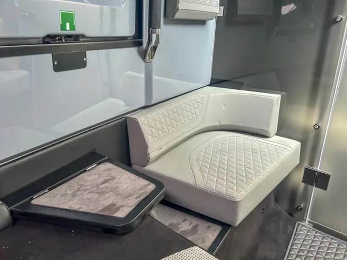  Yacht Photos Pics Interior seating area of 2024 BRABUS Shadow 1000 ST with quilted upholstery.