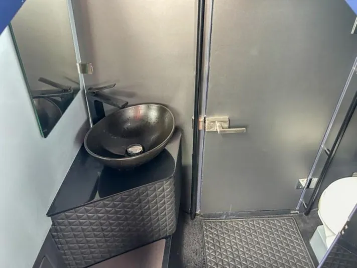  Yacht Photos Pics 2024 BRABUS Shadow 1000 ST bathroom with modern black sink and sleek design.