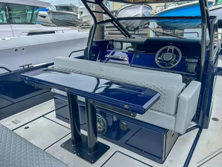  Yacht Photos Pics Interior of 2024 BRABUS Shadow 1000 ST luxury boat with sleek seating and modern dashboard.