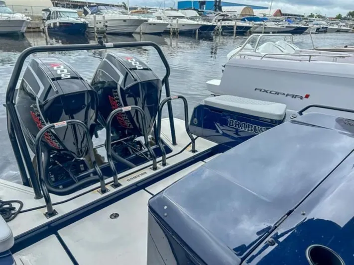  Yacht Photos Pics 2024 BRABUS Shadow 1000 ST boat with twin outboard engines docked at marina.