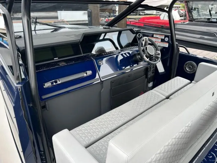  Yacht Photos Pics Interior of 2024 BRABUS Shadow 1000 ST luxury boat with modern dashboard and seating.