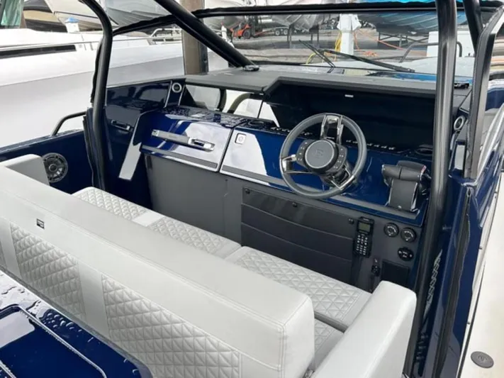  Yacht Photos Pics 2024 BRABUS Shadow 1000 ST boat interior with luxurious seating and modern dashboard.