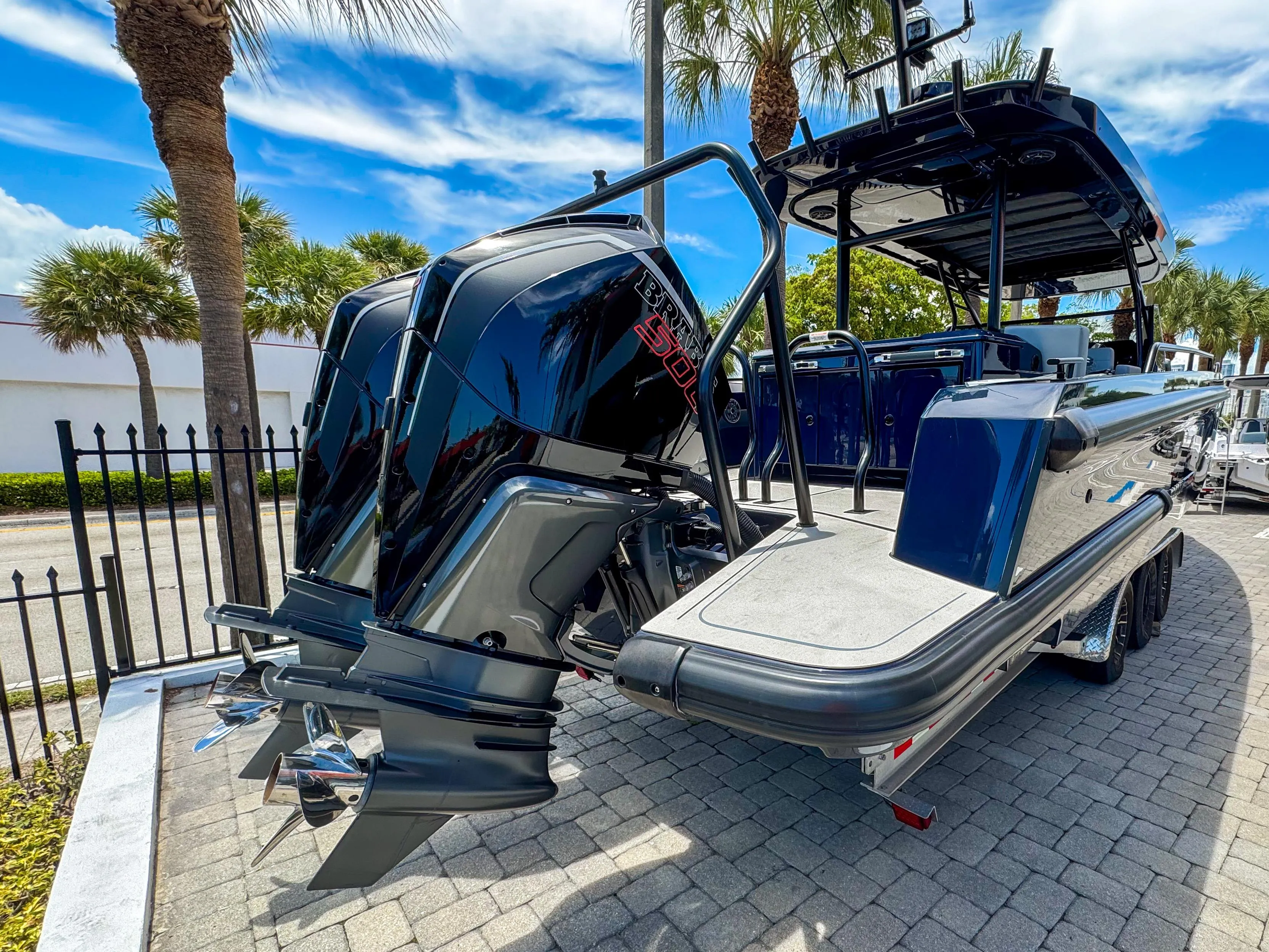 2024 BRABUS Shadow 1000 ST boat with dual engines, parked on a sunny day.